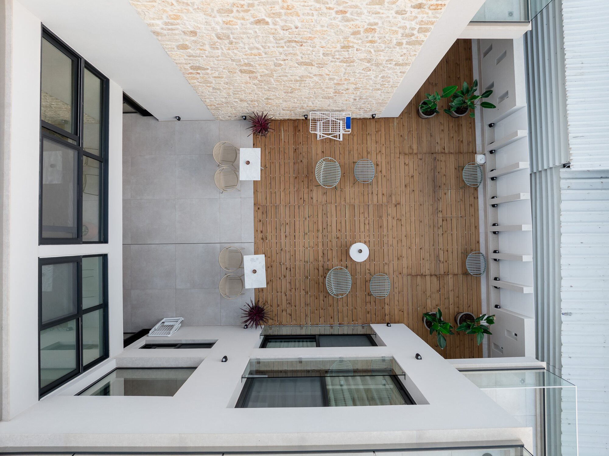 Aetheria North aerial — terrace over the sea