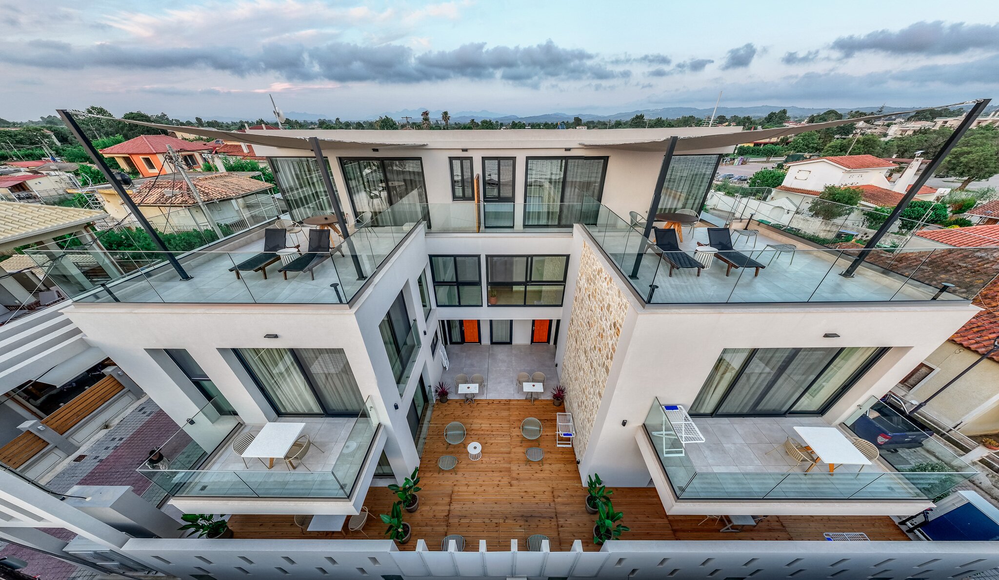 Aerial view of the architecture and rooftop terraces of Aetheria North
